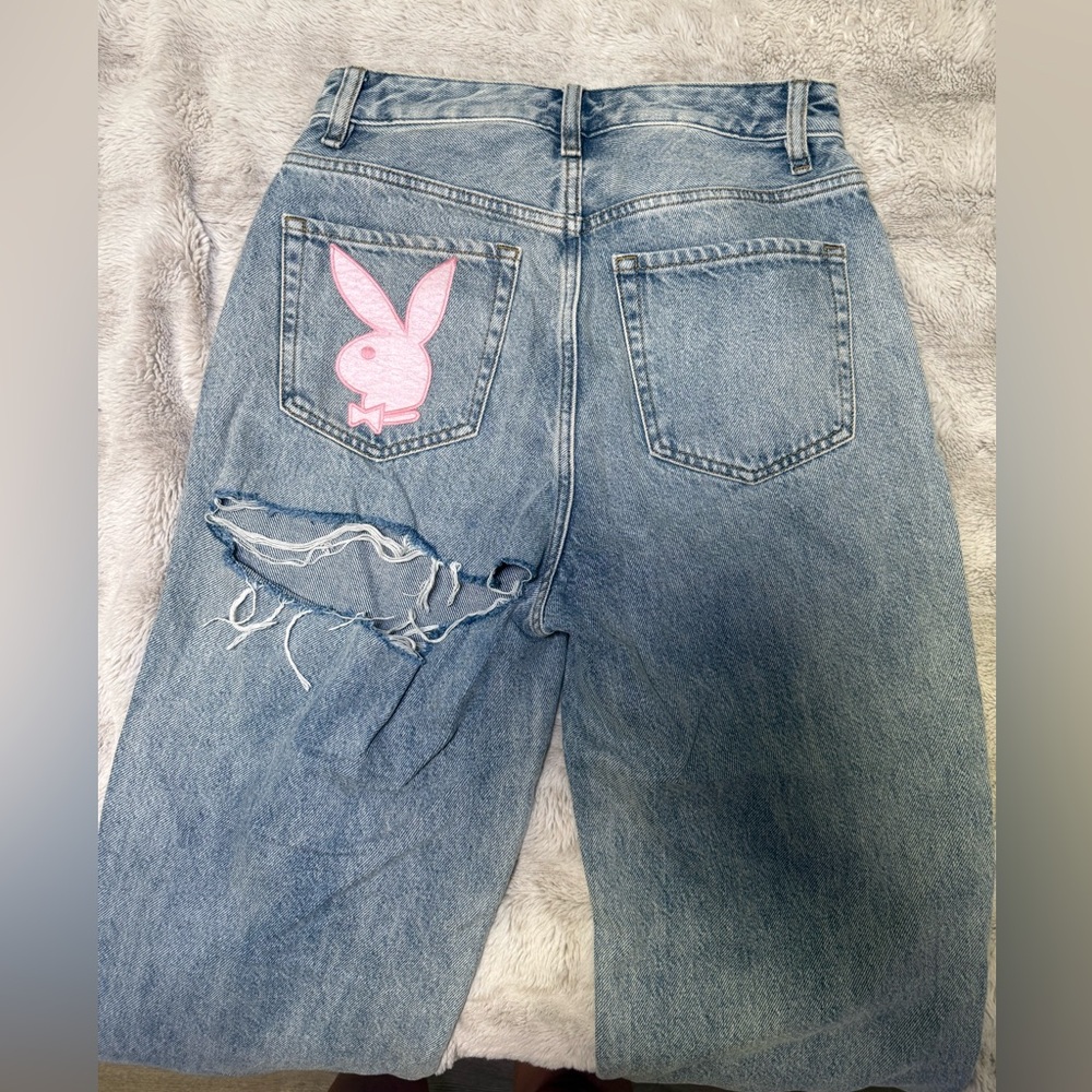 PLAYBOY Women's Distressed Blue Jeans with Pink Logo